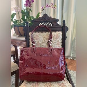 Dark red patent leather Coach purse